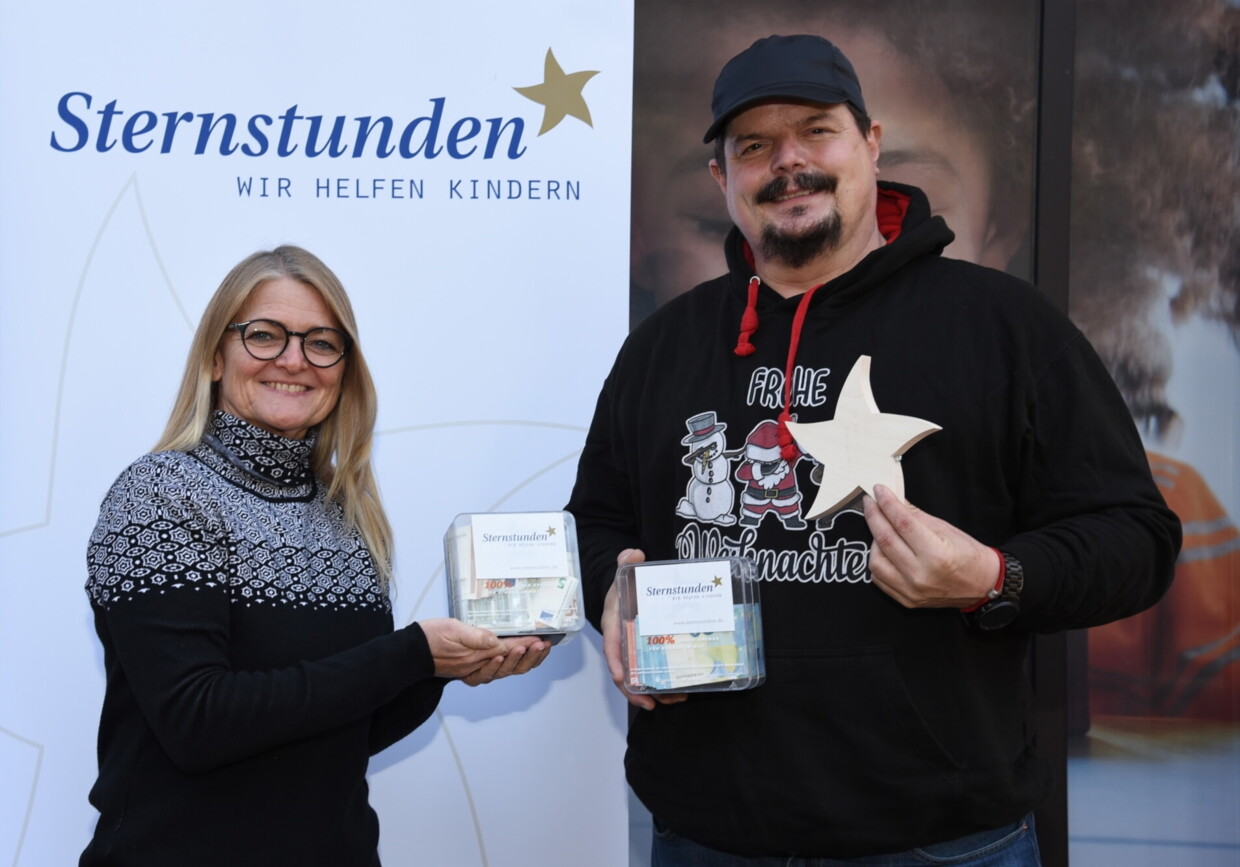 Scheckübergabe für Weihnachtsmarkt auf Dachterrasse Fürth 2021