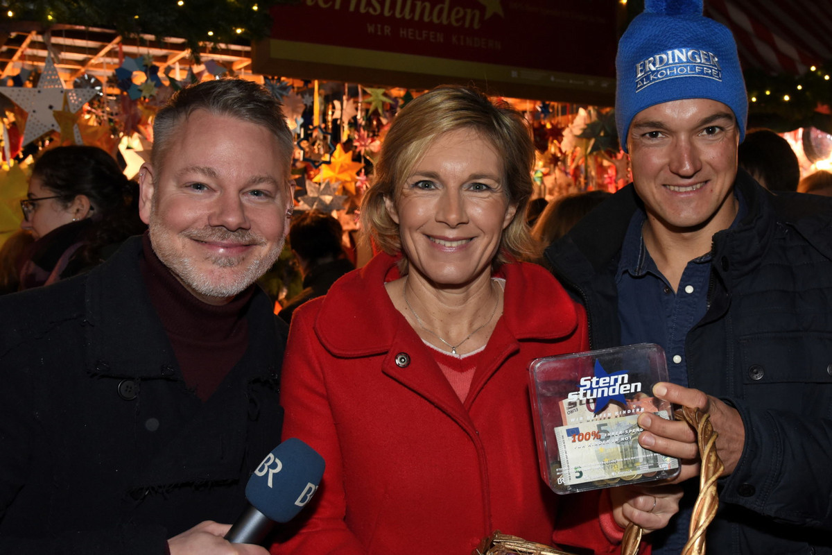 Christkindlesmarkt Nürnberg 2019 v.l.: Tobias Burkhard (BR), Julia Büchler (BR) und Triathlet Andreas Dreitz