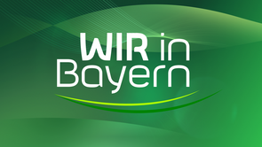Wir in Bayern Schriftzug auf grünem Hintergrund
